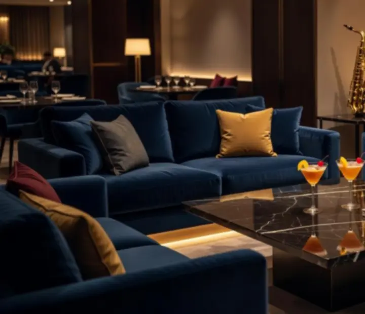 Luxus lounge zóna bársony kanapékkal, hangulatos fényekkel és elegáns italbárral